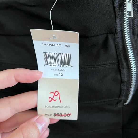 Black bodycon miniskirt with zippers - Picture 3 of 5